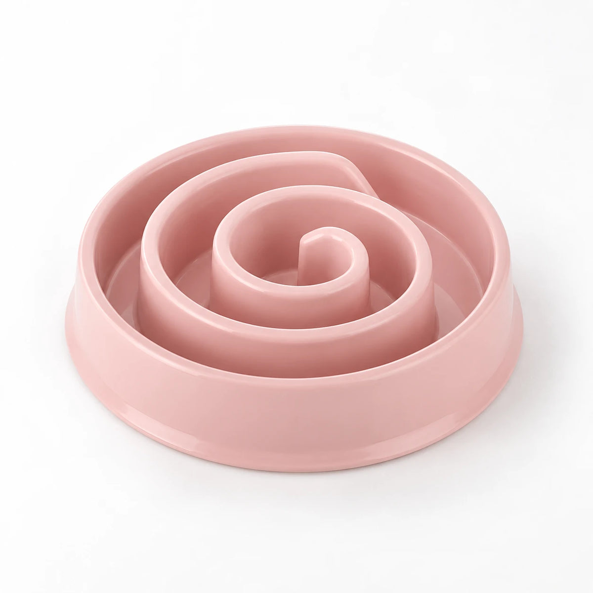 Gamelle anti-glouton rose à parcours en spirale, vue de trois quarts