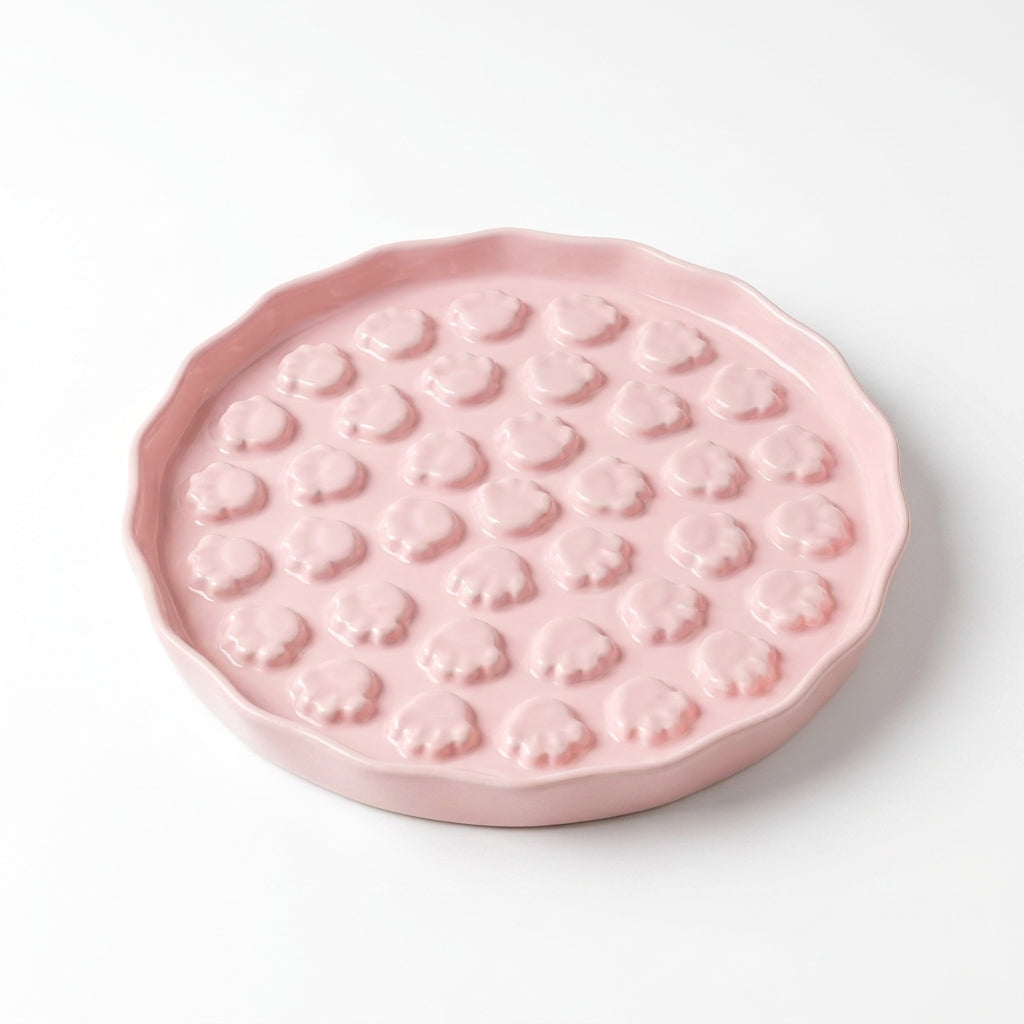 Gamelle anti-glouton en céramique rose, vue de dessus sur ses reliefs