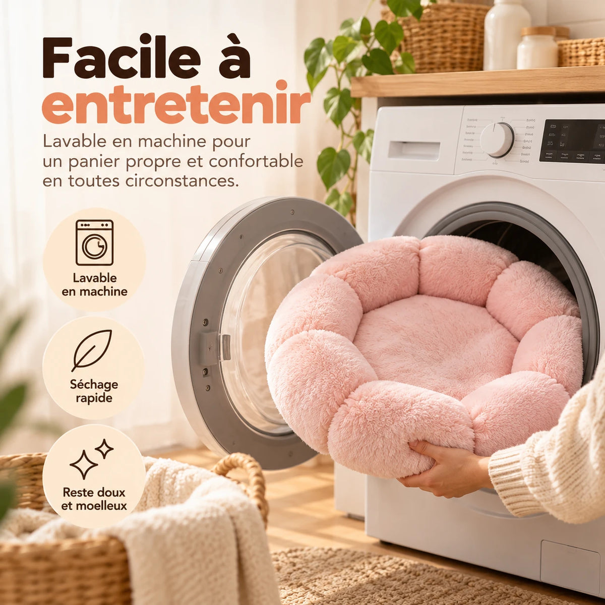 Le panier rose tenu devant un lave-linge ouvert, dans une buanderie