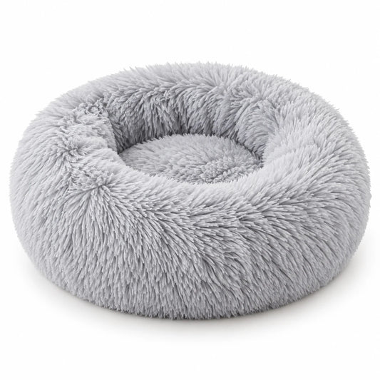 Panier rond en peluche gris clair pour chat, rebord garni sur tout le tour et centre plat